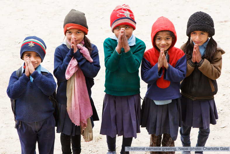 Children in Nepal giving Namaste greeting