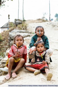 Handing out pencils in Nepal